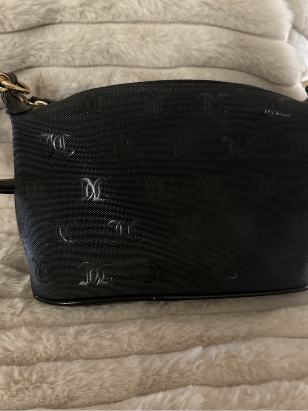 Juicy Couture Black Embossed Mini bag